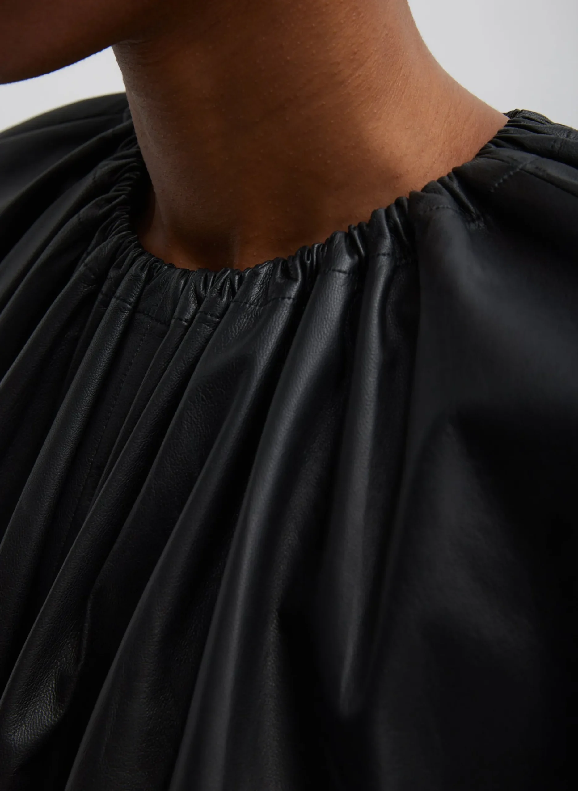 Feather Weight Leather Shirred Neck Circular Top